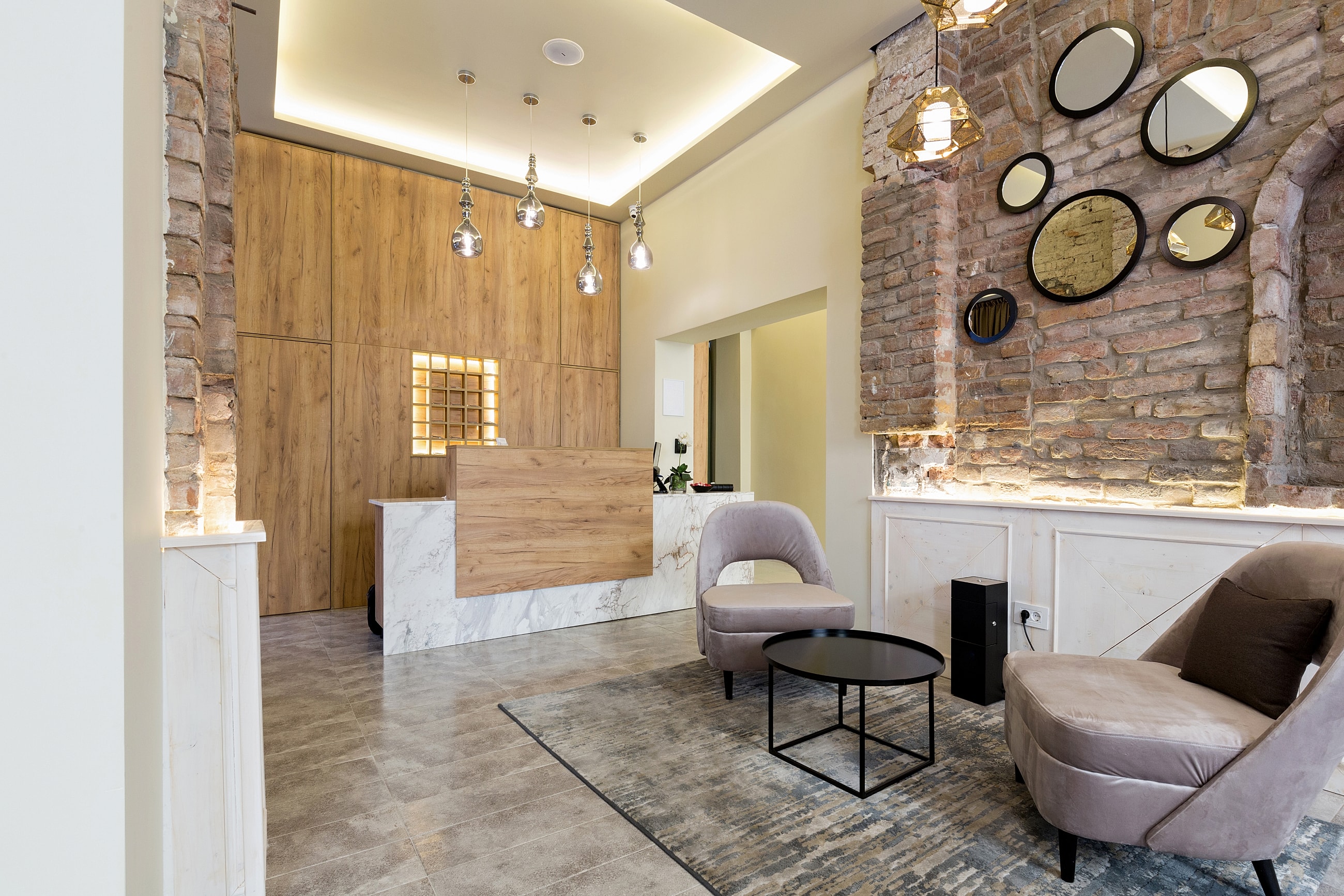Modern reception area with stylish furniture and decor.